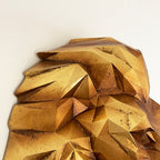 Geometrischer Goldlöwen-Wandkopf