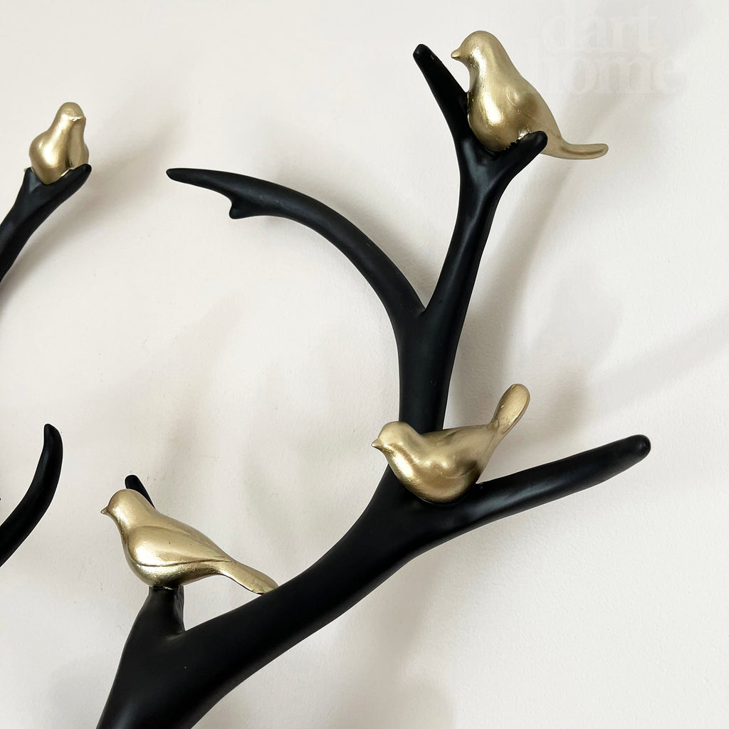Black Stags Head With Gold Bird Decoration