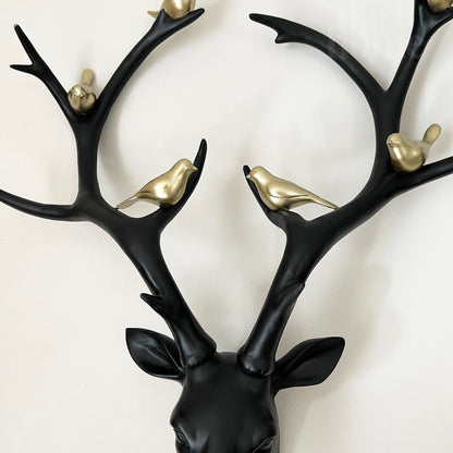 Black Stags Head With Gold Bird Decoration