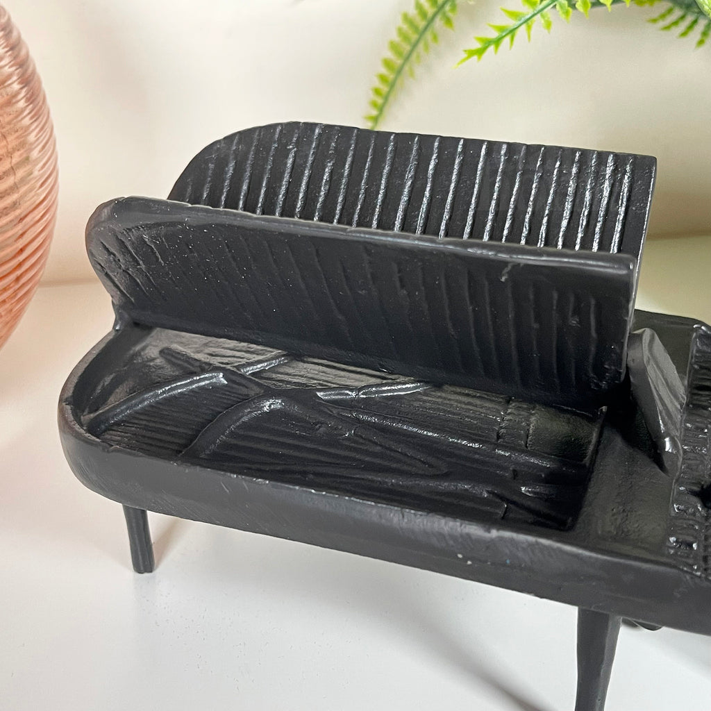 Cast Iron Piano Player Figurine