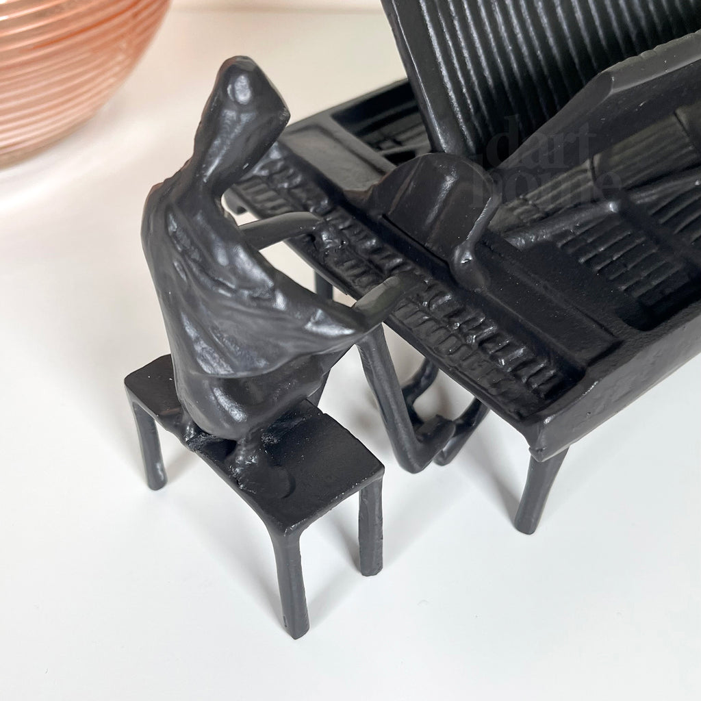 Cast Iron Piano Player Figurine