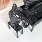 Cast Iron Piano Player Figurine