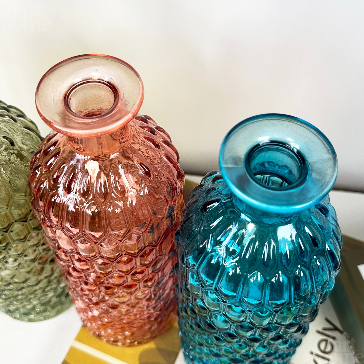 Set mit 4 farbigen Flaschenvasen