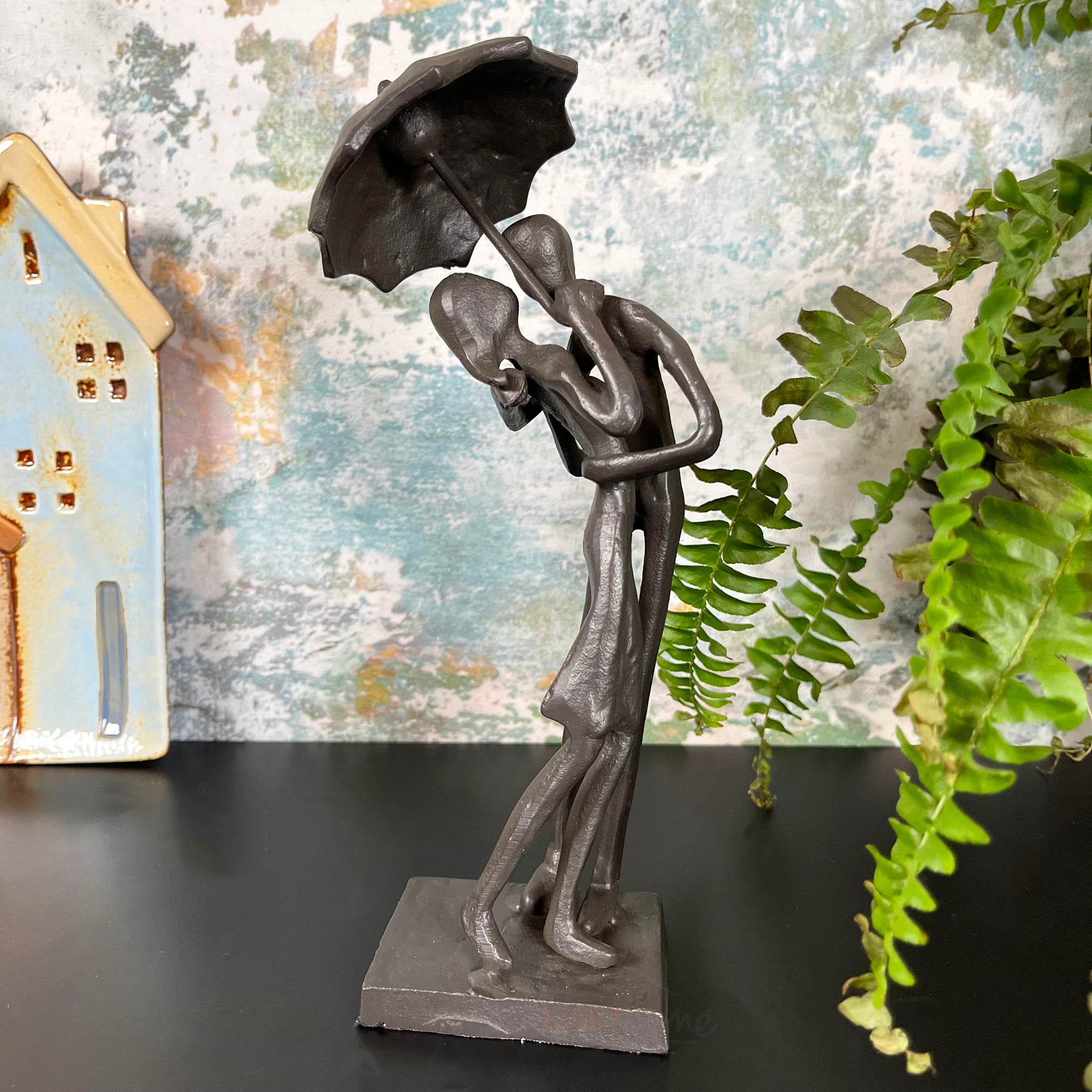 Cast Iron Kissing Couple Figurine