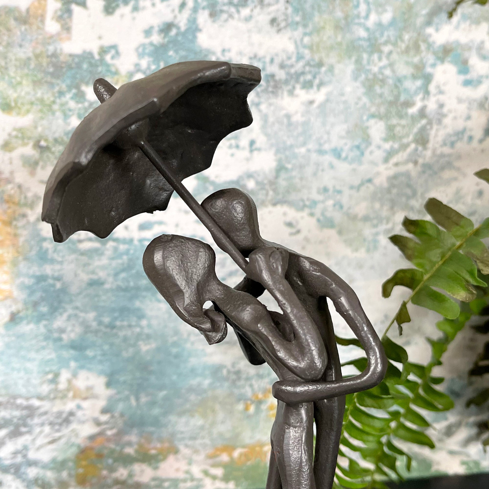Cast Iron Kissing Couple Figurine