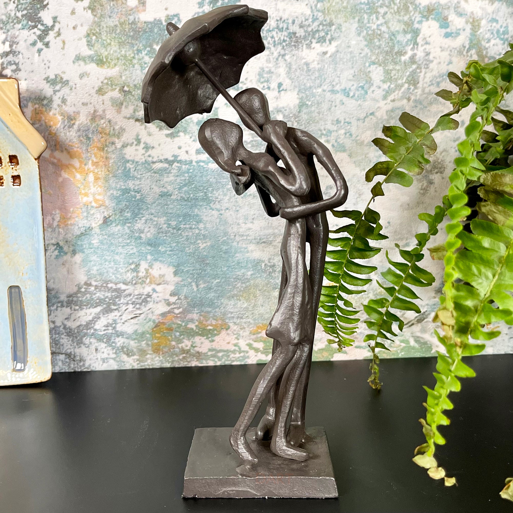 Cast Iron Kissing Couple Figurine