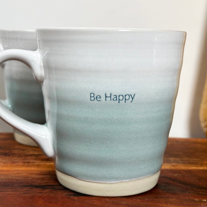 Set Of 2 Blue Be Happy Quote Mugs 500ml