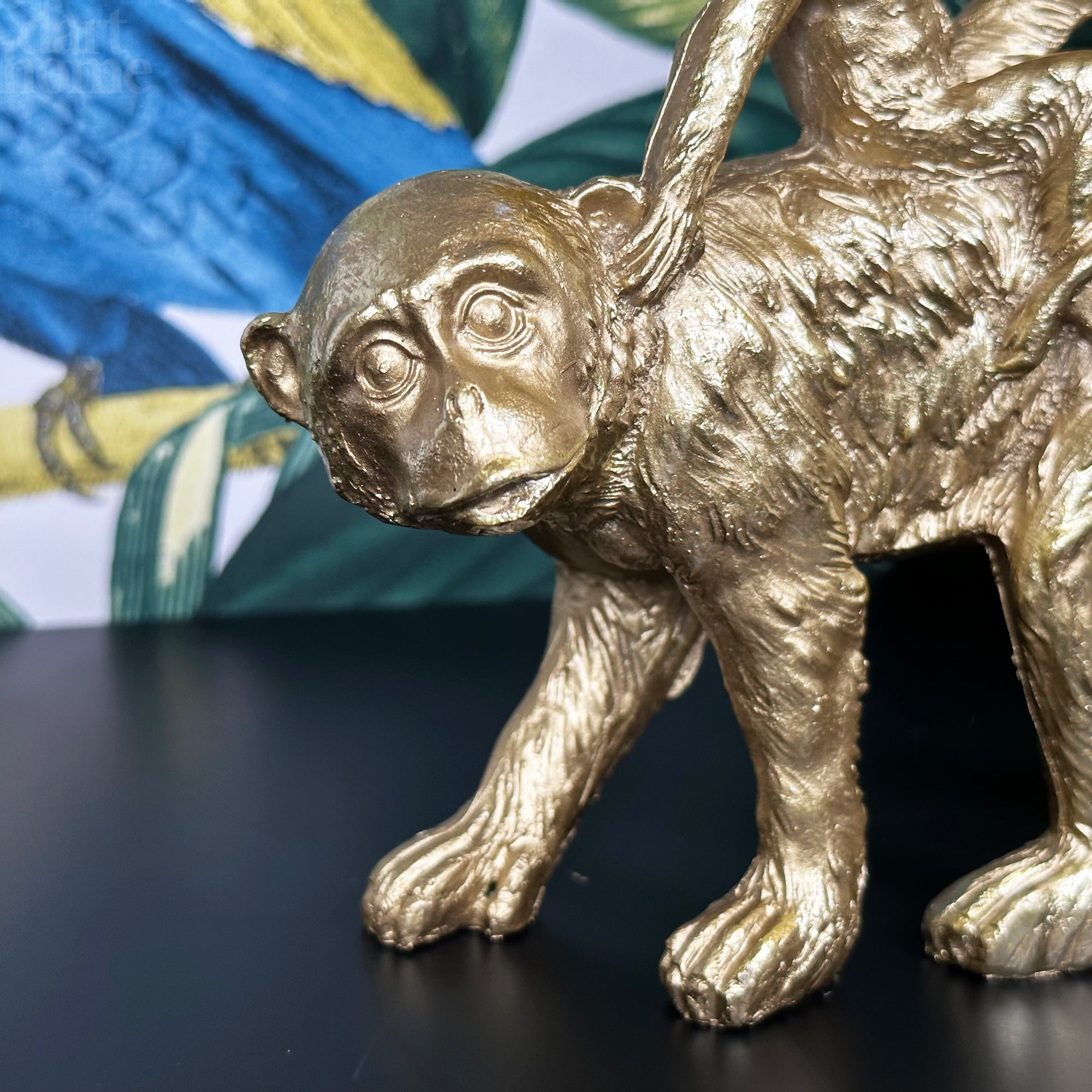 Goldene Affenfigur