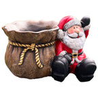 Weihnachtsmann-Sackpflanzer aus Zement