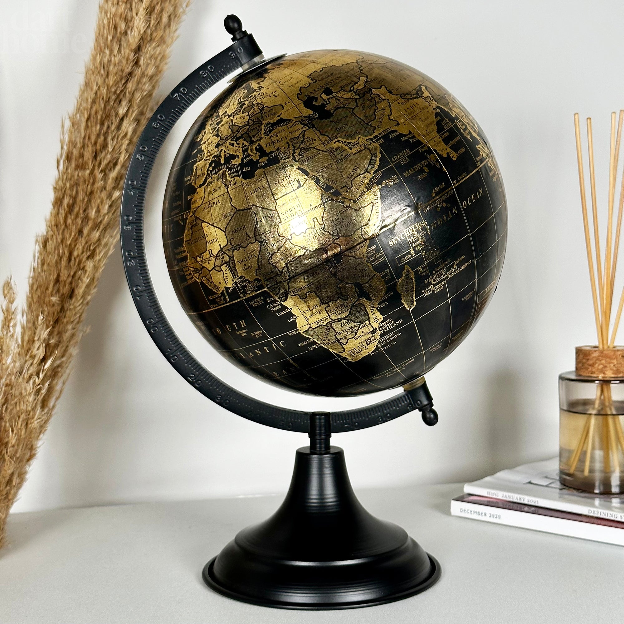Decorative Globe On Black Metal Stand