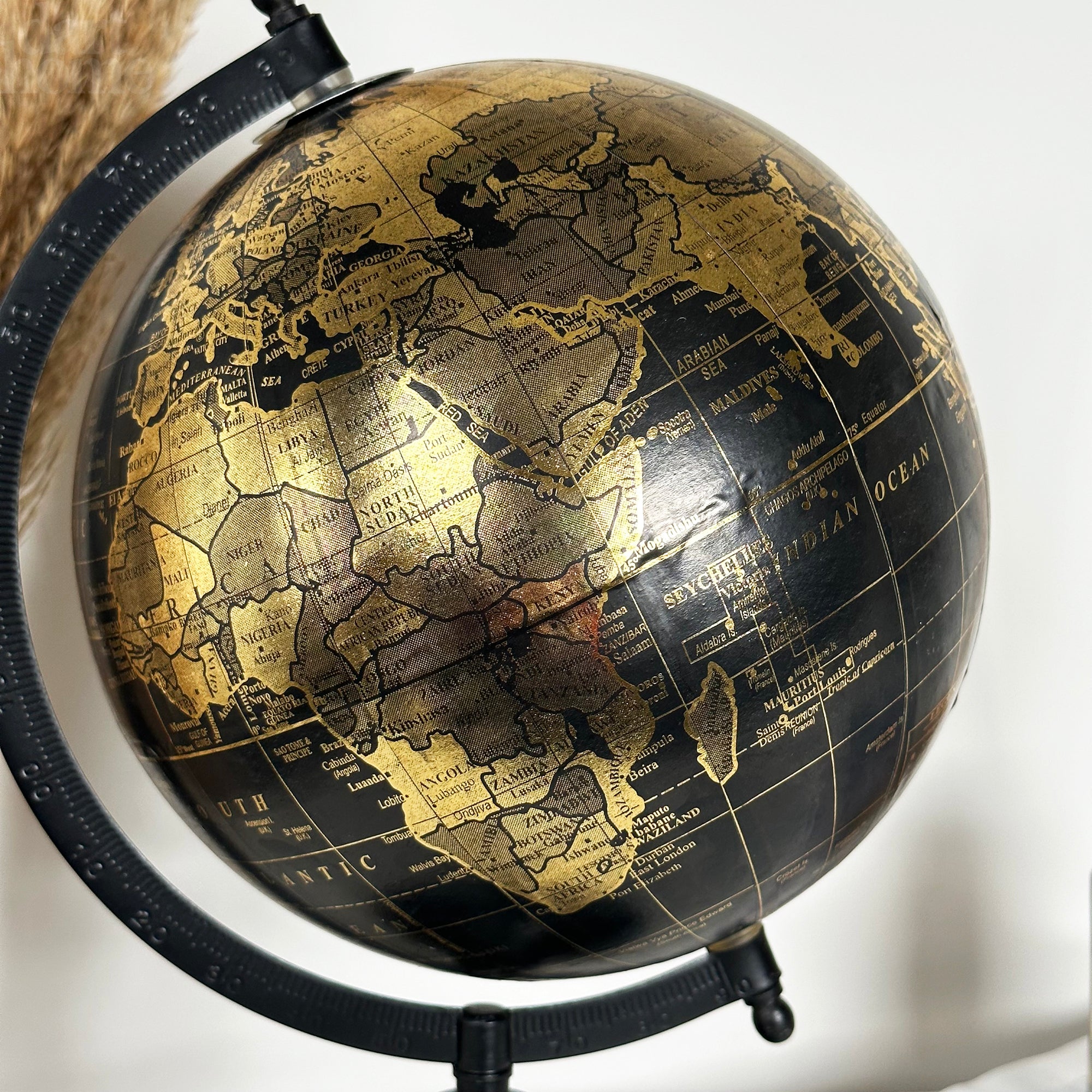 Decorative Globe On Black Metal Stand