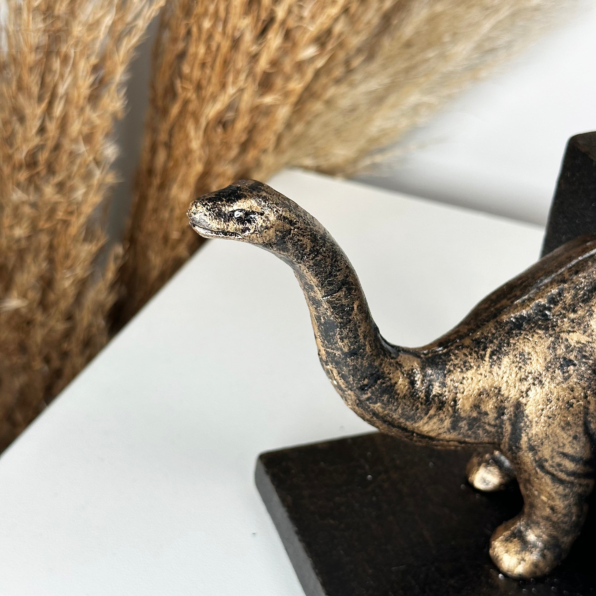 Brontosaurus-Buchstützen aus Gusseisen und Bronze