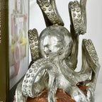 Silberne Oktopus-Buchstützen