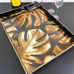 Goldenes Monstera-Blatt-Display-Tablett