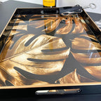 Goldenes Monstera-Blatt-Display-Tablett