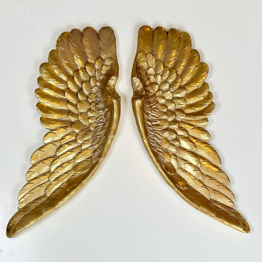 Antike goldene hängende Engelsflügel