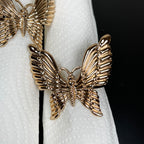 Set mit 2 goldenen Schmetterlings-Serviettenringen