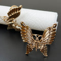 Set mit 2 goldenen Schmetterlings-Serviettenringen