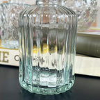 Set Of 4 Bottle Ribbed Glass Vases