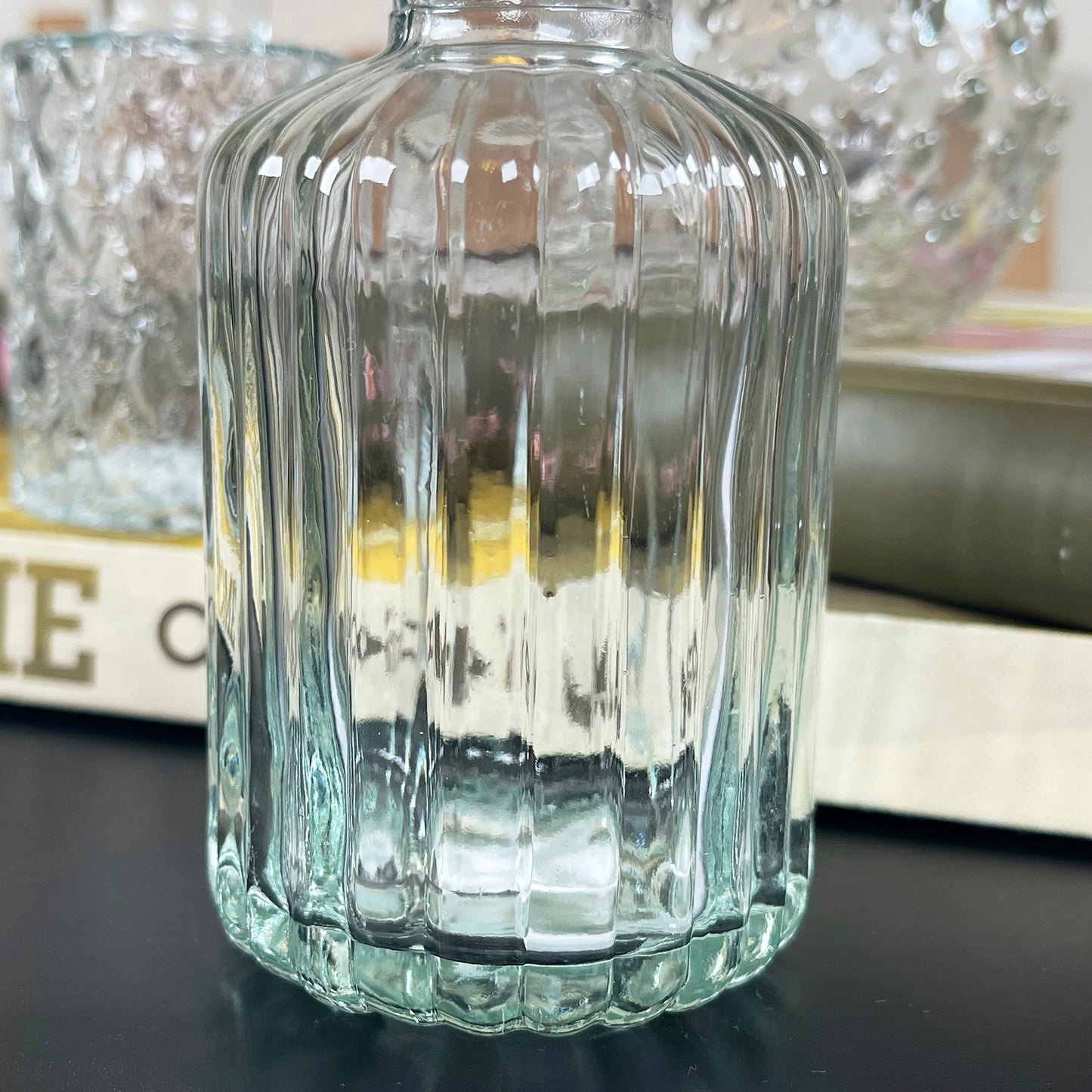 Set Of 4 Bottle Ribbed Glass Vases