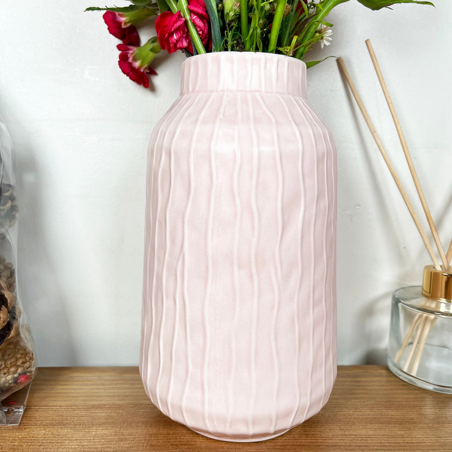 Gestreifte pastellrosa Vase