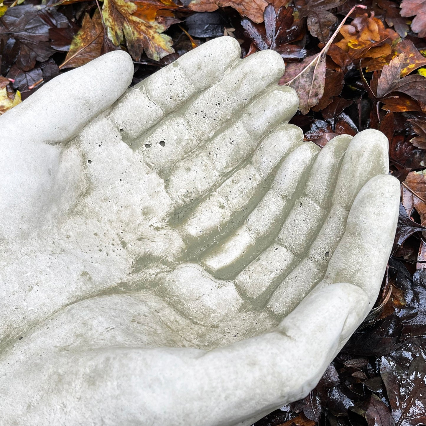 Stone Hand Of Hope Bird Feeder