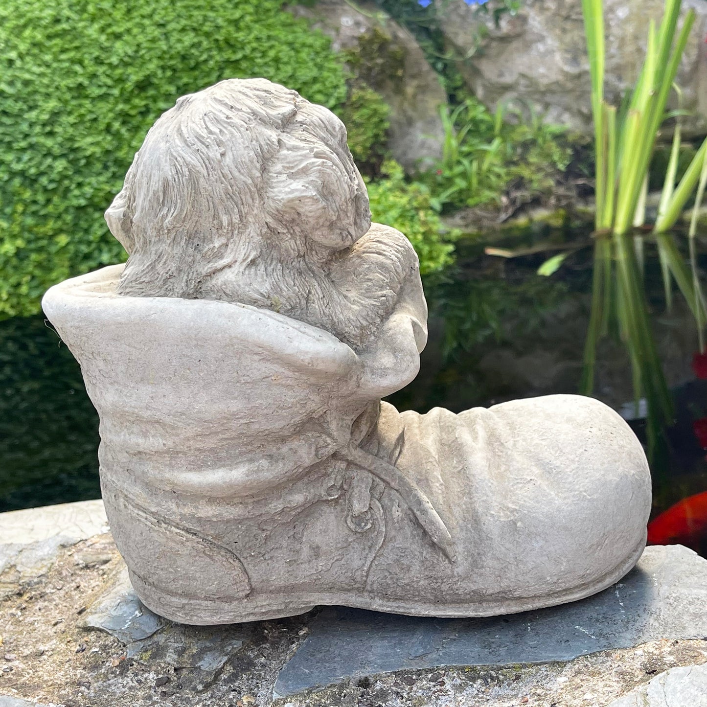 Stone Dog In Boot Garden Ornament