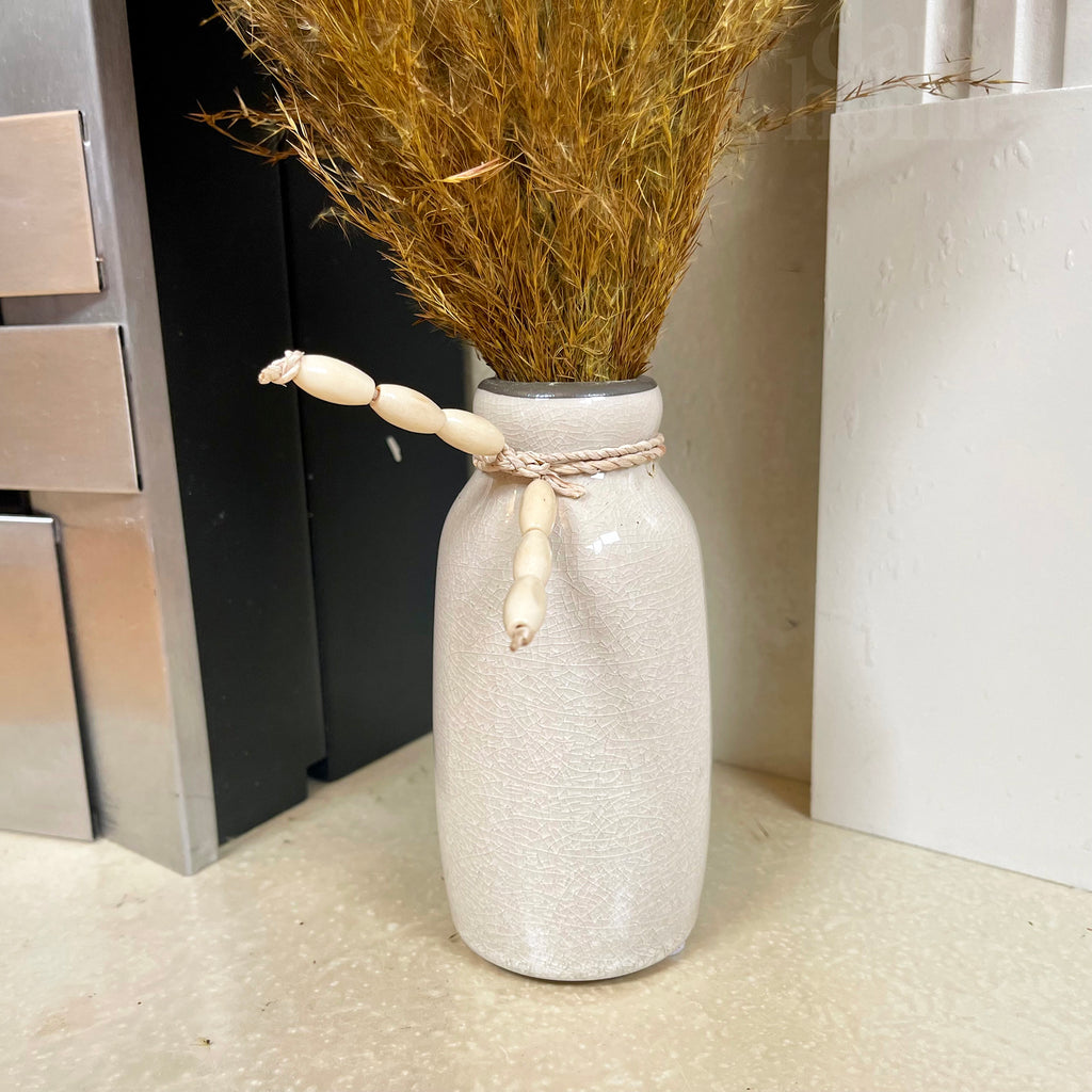 Goldgetrocknete Pampas in Keramikvase