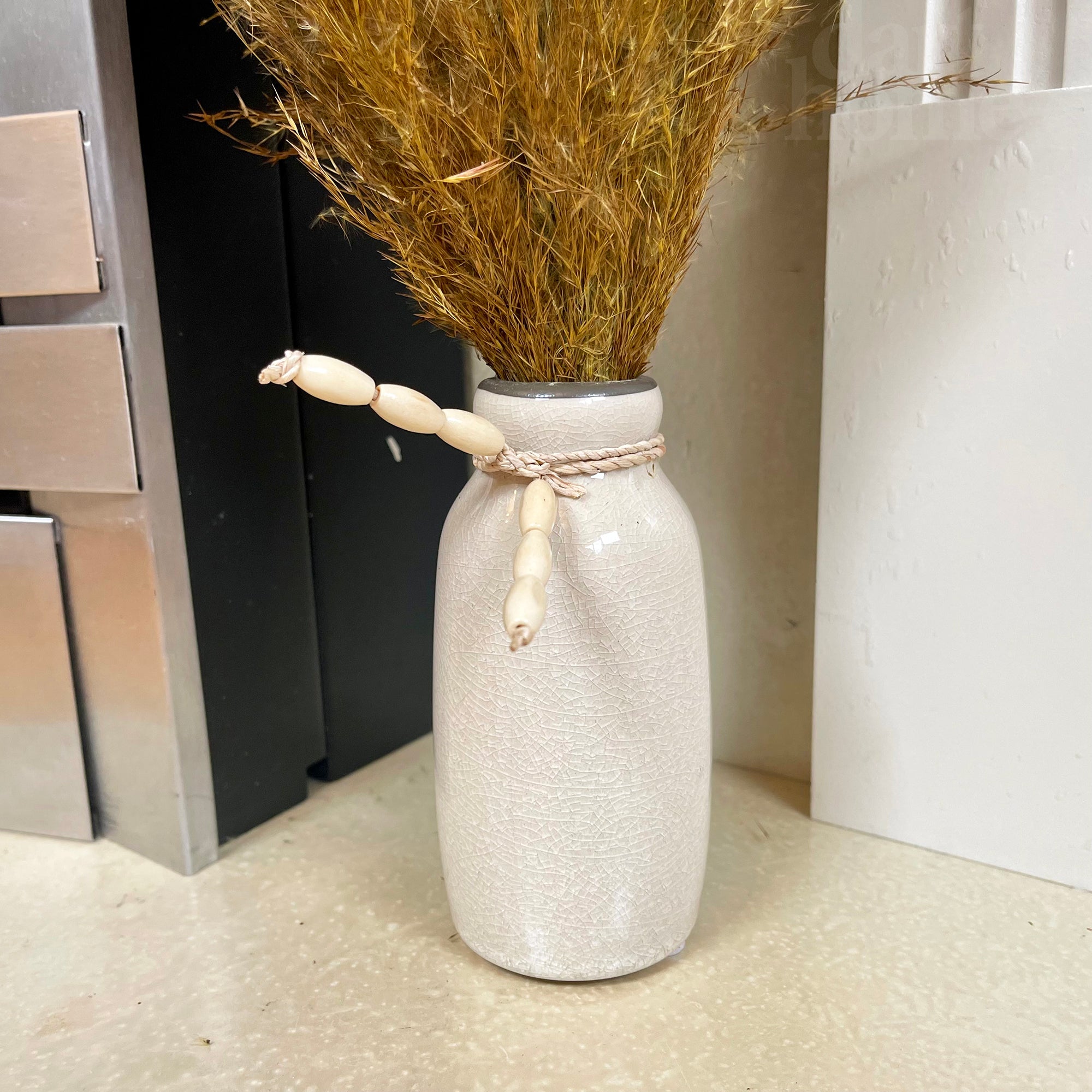 Goldgetrocknete Pampas in Keramikvase