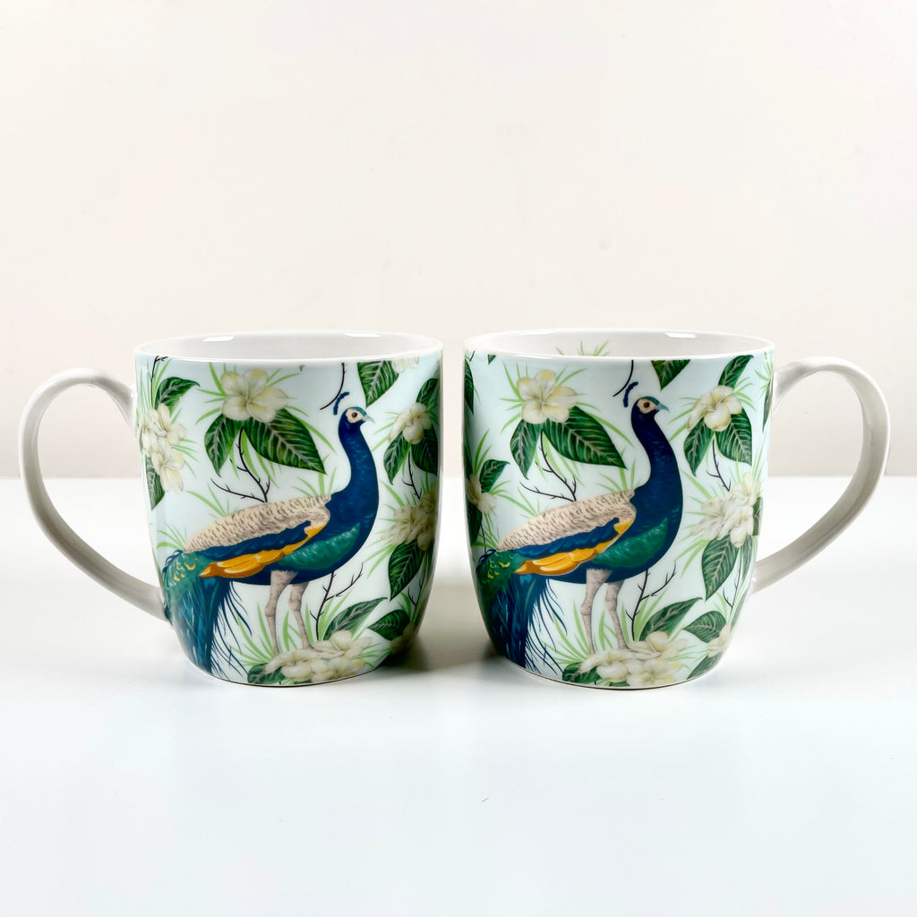 Set mit 2 blauen exotischen Pfauen-Keramikbechern