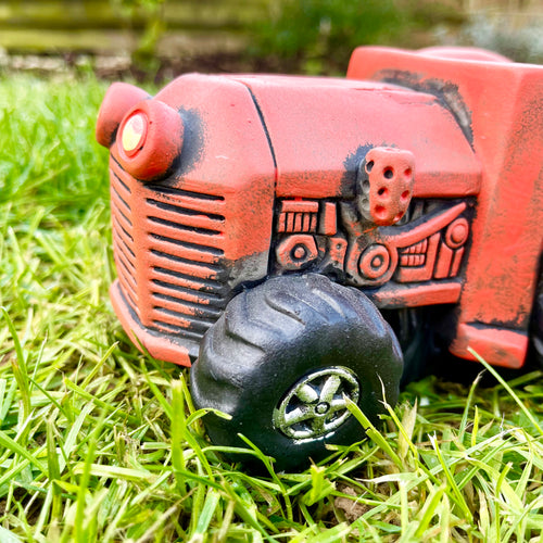 Zementorangefarbener Traktor-Gartenpflanzer 20 cm