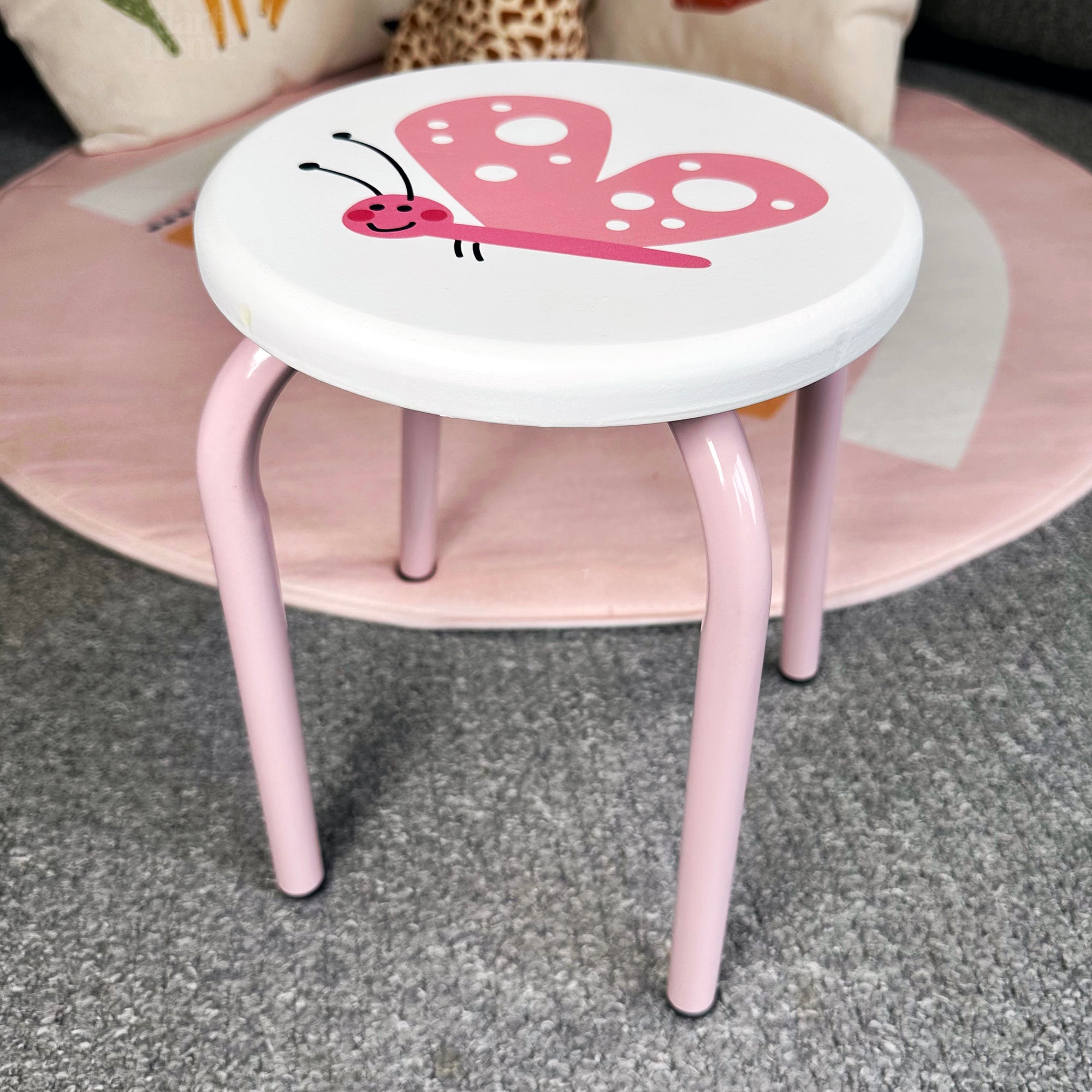 Rosa Schmetterlings-Kinderhocker