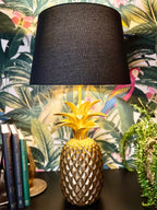 Goldene Ananaslampe mit schwarzem Schirm