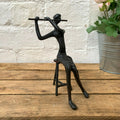 Cast Iron Flute Playing Woman Figurine